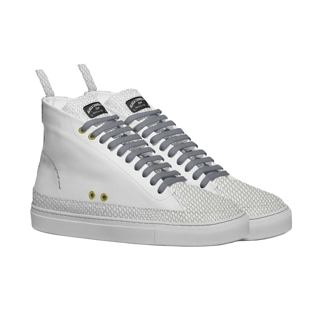 Aerodynamic white sneaker with soft panels, cotton laces, metallic eyelets, and a lightweight rubber sole for comfort and modern street style.

aerodynamic sneakers, minimalist white sneakers, motor inspired shoes, lightweight rubber sole sneakers, men women sneakers, big size sneakers, casual streetwear shoes, modern fashion sneakers