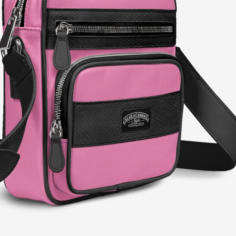 Shop the Textile Pink & Python Print Black Cross-Body Designer Shoulder Bag by Alaila Carroll Style. Features three zippered pockets, a fine Italian shoulder strap, and premium interior finishes in a unisex design.