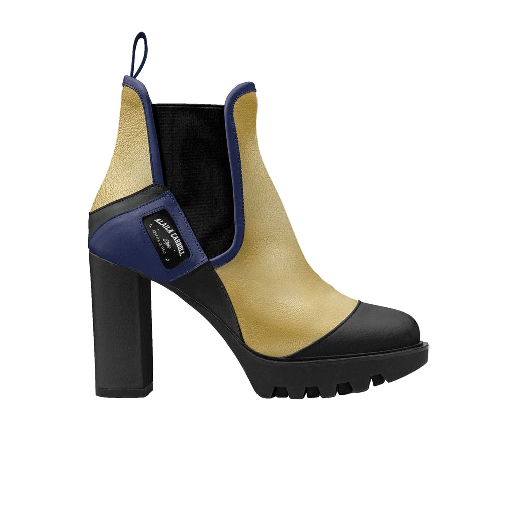 Designed with a 9.9 cm (3.89-inch) material-covered heel, this boot offers height and elegance while maintaining everyday wearability. The lugged black rubber sole ensures superior grip and stability, making it both stylish and practical for all-day confidence. A side-positioned logo adds a refined designer touch, enhancing its luxury appeal.
designer boots for women
suede ankle boots
luxury women’s boots
elastic side boots
high heel designer boots