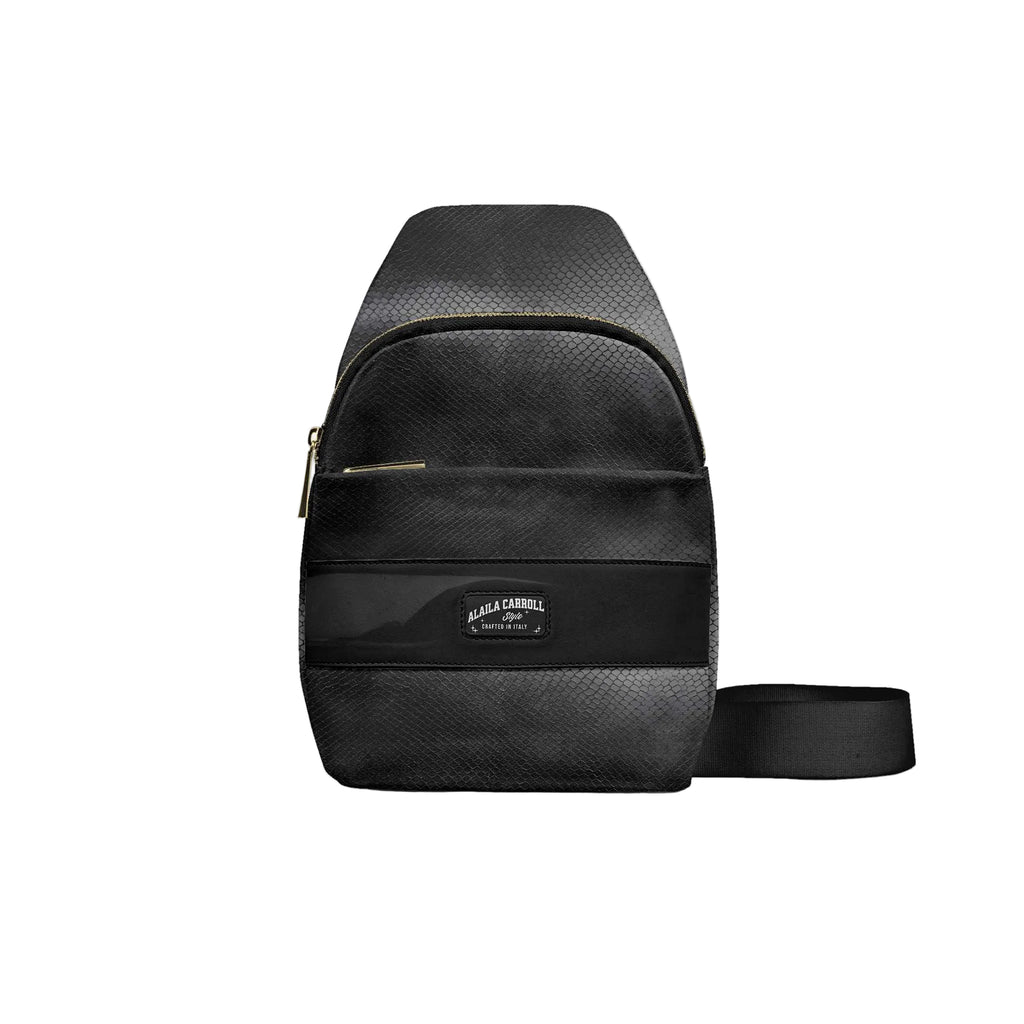 Luxury black crossbody designer bag with triangular design, multiple zip pockets, and three compartments for modern everyday style.

black designer crossbody bag, luxury crossbody purse, triangular designer bag, modern luxury handbag, multi-pocket crossbody bag, upscale travel bag, statement designer bag