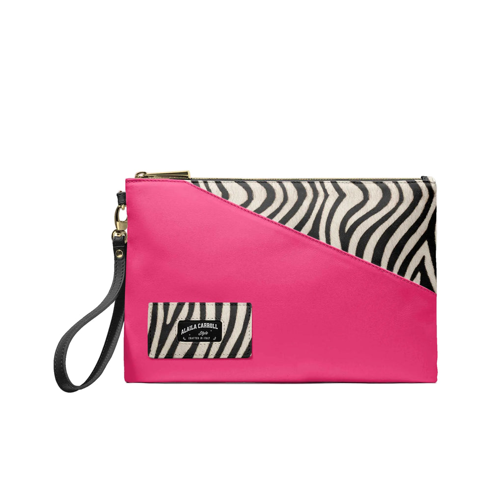 Luxury multiuse designer small bag in pink and zebra with embossed logo

Rectangular luxury bag with geometric detail and metal zipper by Alaila Carroll Style

Slim designer clutch bag with eco leather interior and zebra pattern