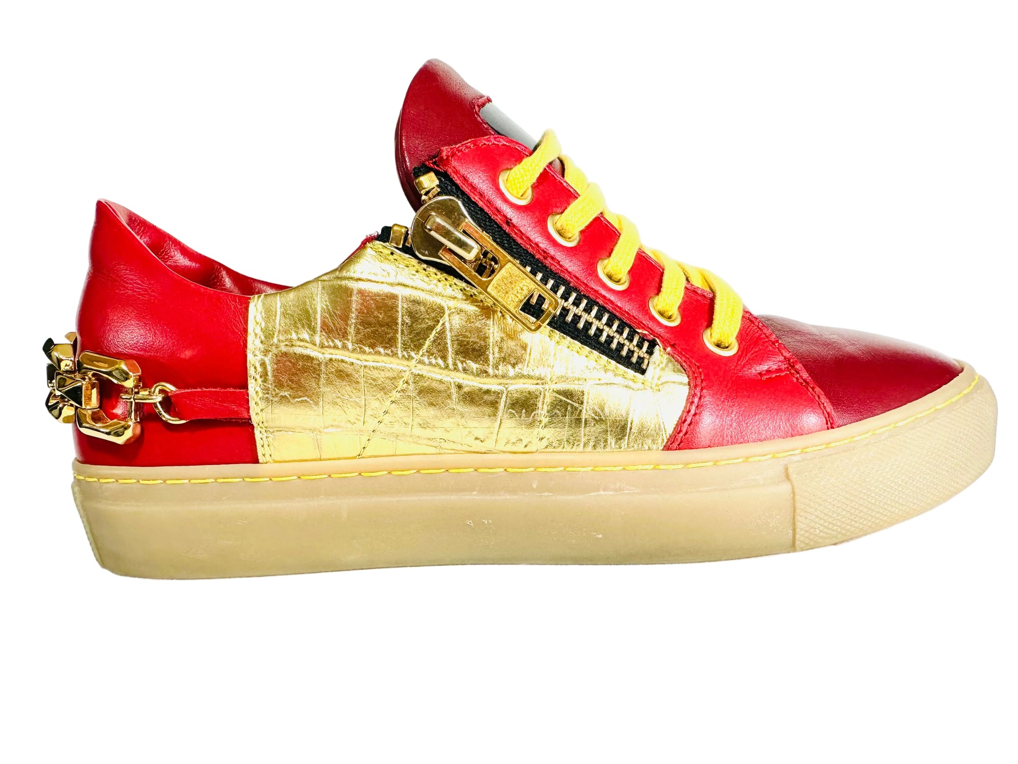 Limited Edition designer sneaker

Official Limited Edition Certificate with unique code (#MD3920)

Red & gold urban low-top design

Metallic accents with side zip and rear chain

Smooth premium Italian materials

Ergonomic extra-light rubber sole

Handcrafted in Italy by master artisans

Protected Alaila Carroll Style design

One-of-a-kind luxury footwear