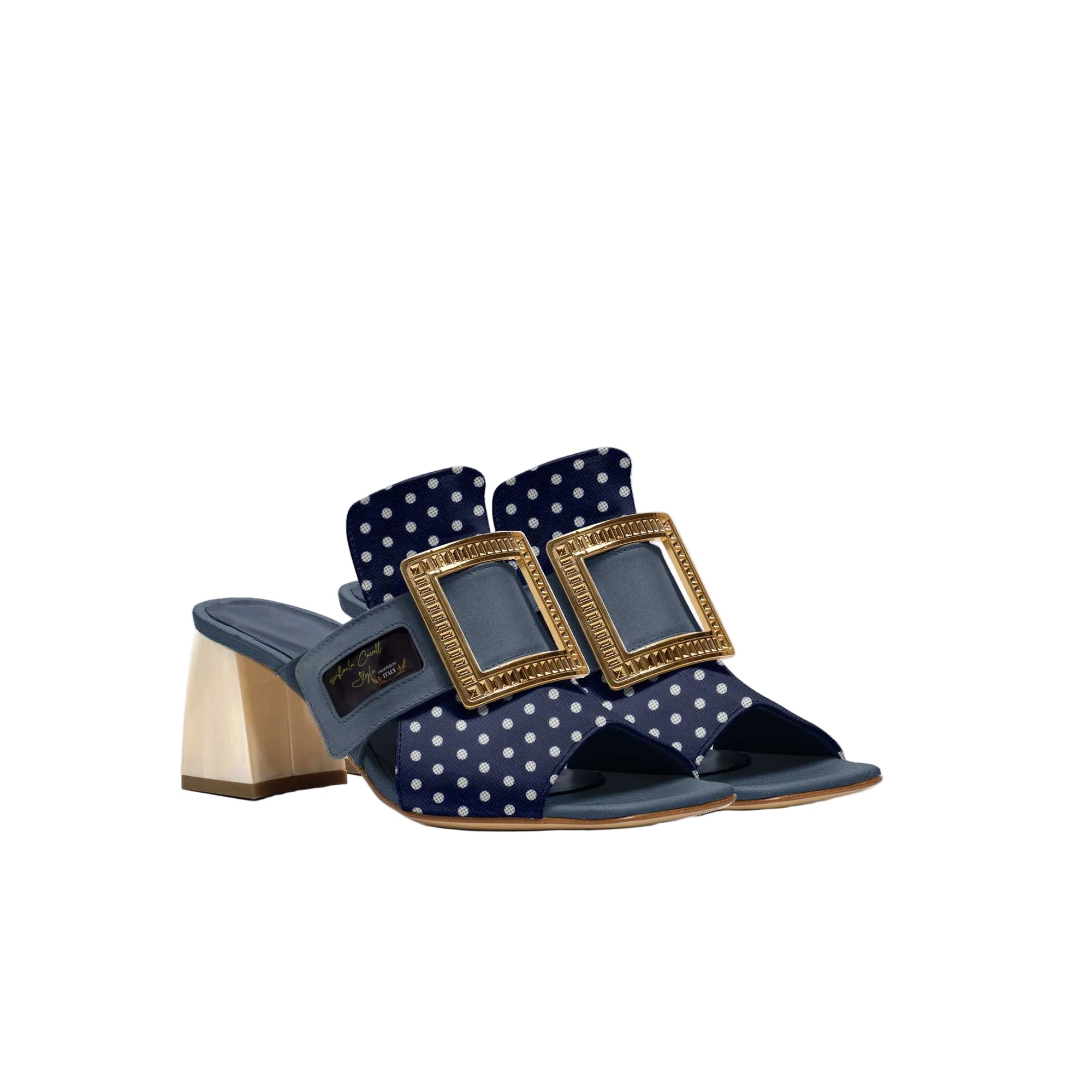 Luxury slide sandal handcrafted in Italy

Blue, gold & white polka-dot design

Fine cutout upper with wide strap

Oversized gold-tone buckle

2-inch block heel for stability

Lightly padded insole for comfort

Signature Alaila Carroll Style logo detail

Ideal for casual wear, summer fashion, and travel