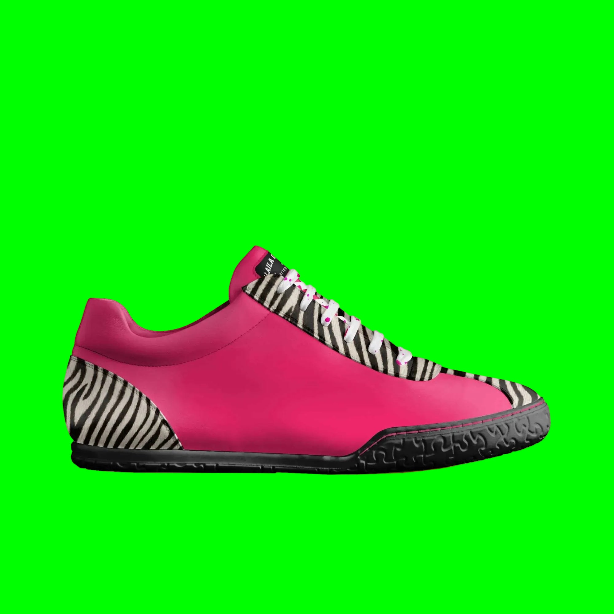 Pink sneaker with zebra pattern sole on a white background