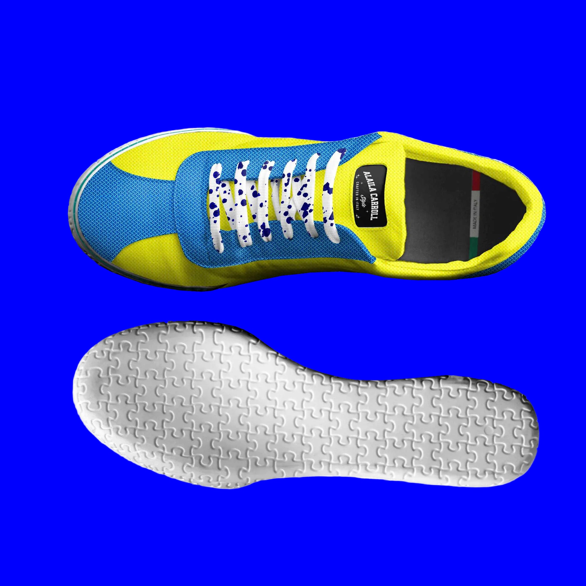 Blue and yellow sneaker with white sole on a white background