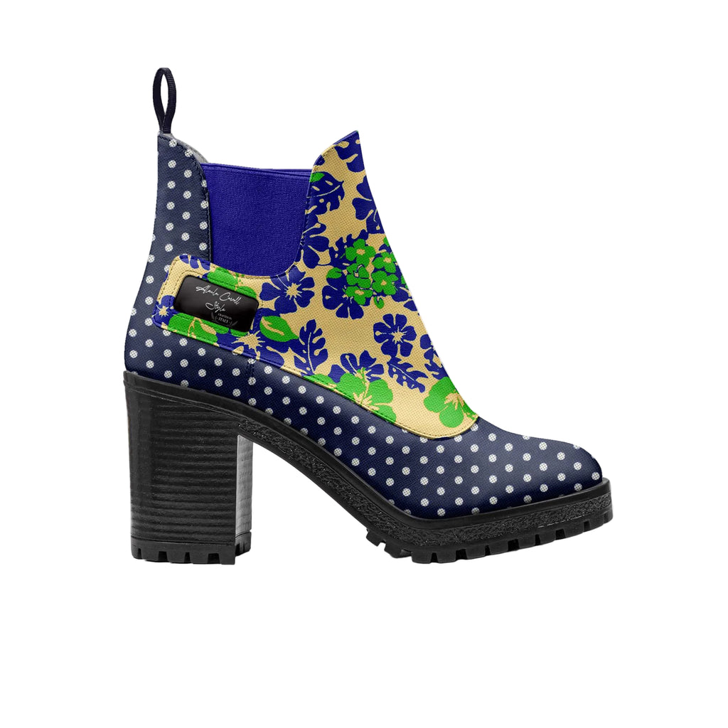 Express bold style with the Slip-On Designer Boot in navy polkadots with green & blue flowers. Crafted from Italian materials with elastic bands, lug sole, and 3.3” heel.
designer slip on boots, women’s sporty boots, floral print boots, polka dot boots, luxury Italian boots, lug sole fashion boots, high heel slip on boots, statement women’s footwear, bold style boots, premium women’s shoes
